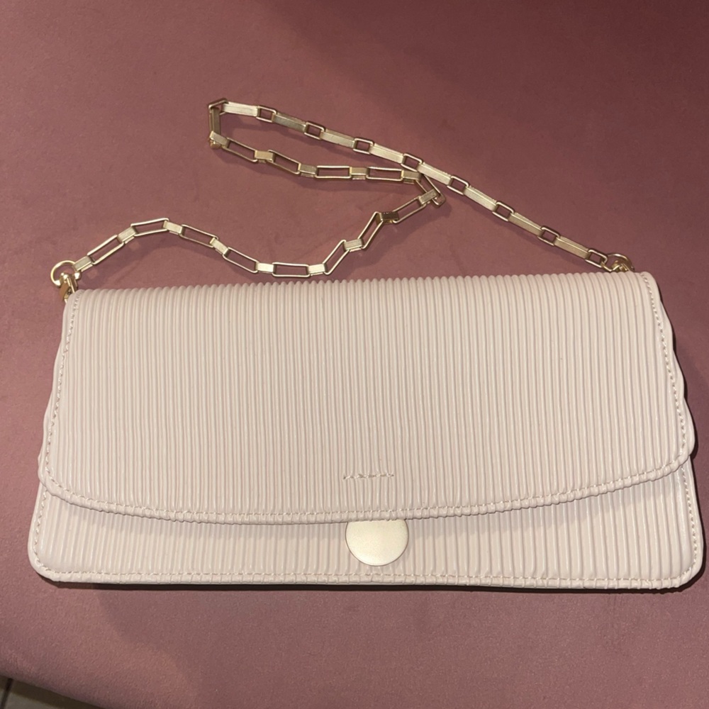Cream textured going out purse